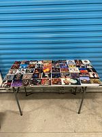 Overview of entire lot spread on table showing quantity and variety