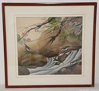 Front view of framed watercolor showing birds, stream, mat and frame