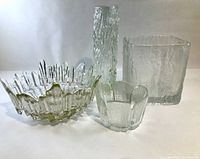 front view of all four clear textured glass pieces