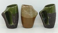 Front view showing three mugs and glaze patterns