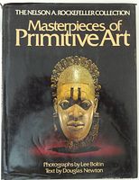 Front dust jacket showing title and mask image