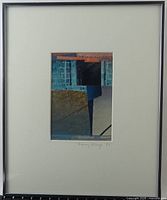Front view of framed collage showing artwork, mat and frame