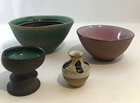 Group shot displaying all four pottery pieces