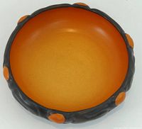 Top view showing orange interior and rim accents