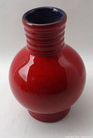 Front view of vase showing body shape and glaze