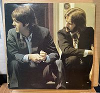 Front cover showing Paul McCartney and Ringo Starr seated