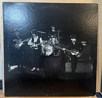 Front laminated cover with stage photo of Beatles