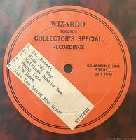 Orange Wizardo Rekords label with paper strip track list