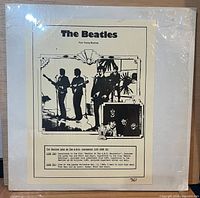 Front jacket with photocopy insert showing title, track list and catalog number 361