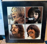 Front of outer slipcase showing four portrait panels