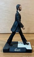 Left profile of Ringo Starr figurine on crosswalk base