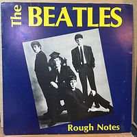 Front sleeve showing title, band photo, blue and yellow design