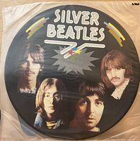 Front side of 12-inch Beatles picture disc in plastic sleeve