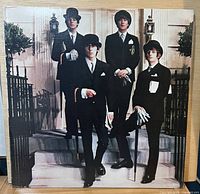 Front cover with Beatles image in bowler hats