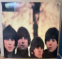 Front laminated album cover showing Beatles portrait and Apple Records logo