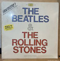 Front cover sealed in shrink with import sticker visible