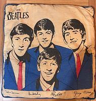 Front of pillow showing Beatles portrait, logos and signatures