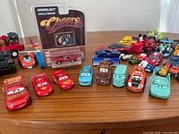 Front view of carded Corvette and Disney Cars die-casts