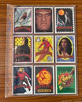 Fronts of all nine trading cards in binder sleeve