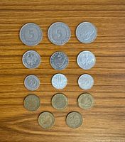 Obverse sides of entire 14-coin lot laid out