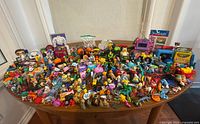 Entire assortment of toys spread on table