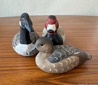 Front angled view of all three decoys showing size and paint detail