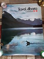Poster with moose in lake and mountain scenery