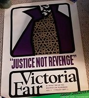 Full view of printed poster showing artwork and text