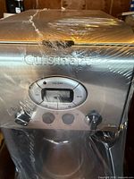 Front view showing control panel, display, buttons, wrap