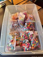 Overall tote view showing multiple sealed bead bags