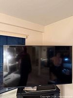 Front view of Sony flat screen TV powered off