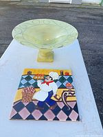 Compote and tile trivet together on table