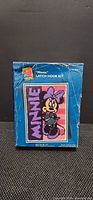 Front of boxed Minnie Mouse latch hook kit showing design and branding