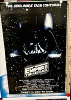 Full view of poster showing artwork, credits, and tagline