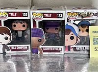 Front view of all three boxed Funko Pop figures