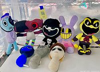Group shot of all eight plush toys