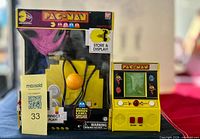 Front view boxed Plug & Play joystick and Mini Arcade unit