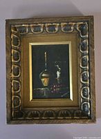 Front view of framed painting showing artwork and entire frame