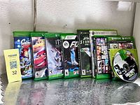 Front view showing all eight game items on shelf