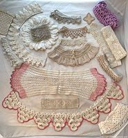 All crochet pieces laid out showing quantity and colour range