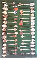 All 32 spoons laid out showing variety