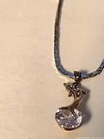 Alternate angle of pendant and chain texture