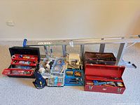 Group shot showing ladders, toolboxes, leather bag, sander, organizers and accessories