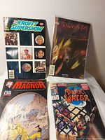 Group shot of four comic books