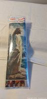 Front view of sealed diamond painting kit showing Jesus image and item number