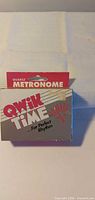 Front of boxed Qwik Time quartz metronome