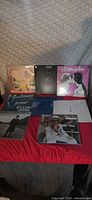 All eight Elton John albums displayed on table