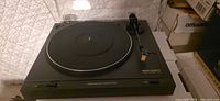 Top view of Vector Research VT-150 turntable showing platter, tonearm, controls