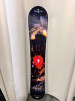 Full deck front view showing graphic and inserts