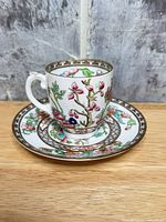 cup on saucer front view showing pattern